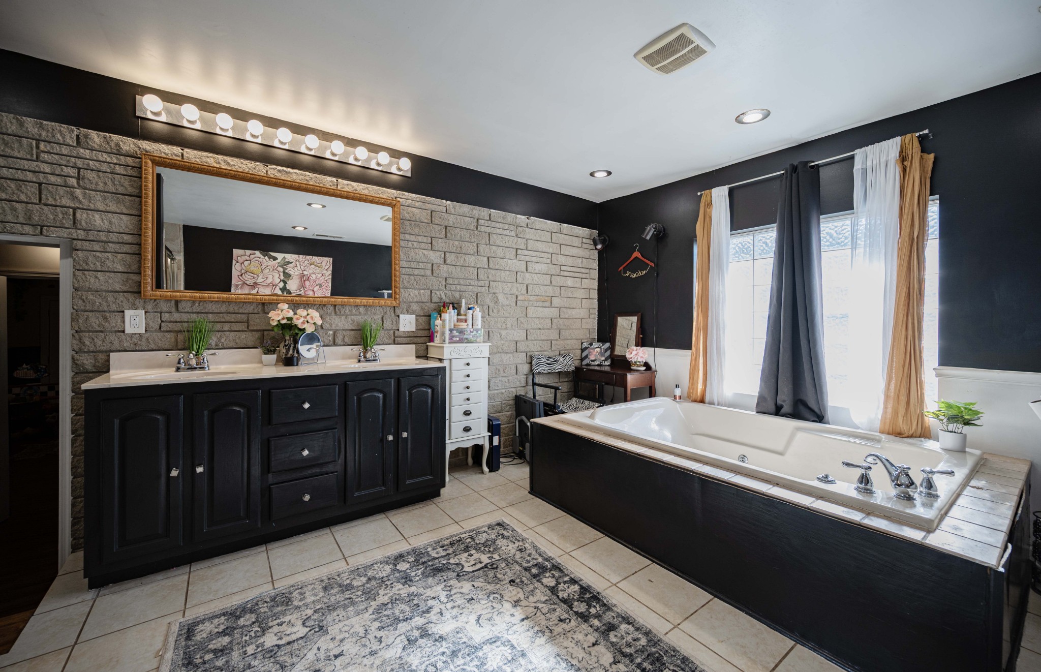 1704 3rd Avenue Manchester, TN 37355 - Photo 14 of 34 a spacious bathroom with a double vanity sink and a mirror