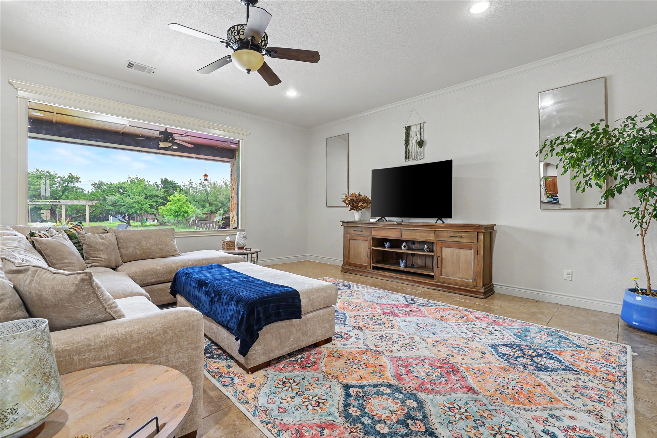 Undisclosed Address Georgetown, TX 78633 - Photo 13 of 39 a living room with furniture and a flat screen tv