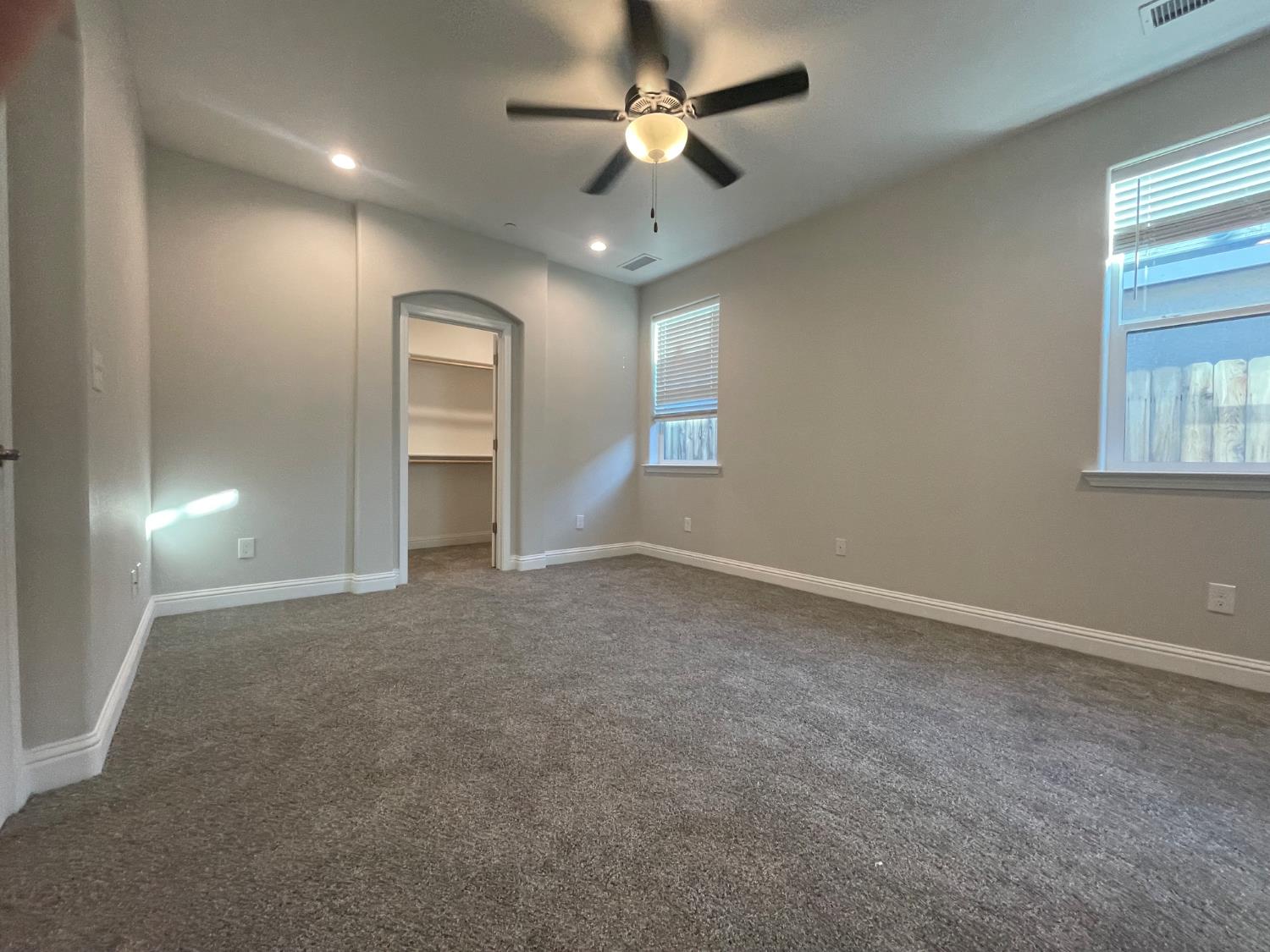 105 South Walnut Avenue Kerman, CA 93630 - Photo 9 of 22 a view of an empty room with a window