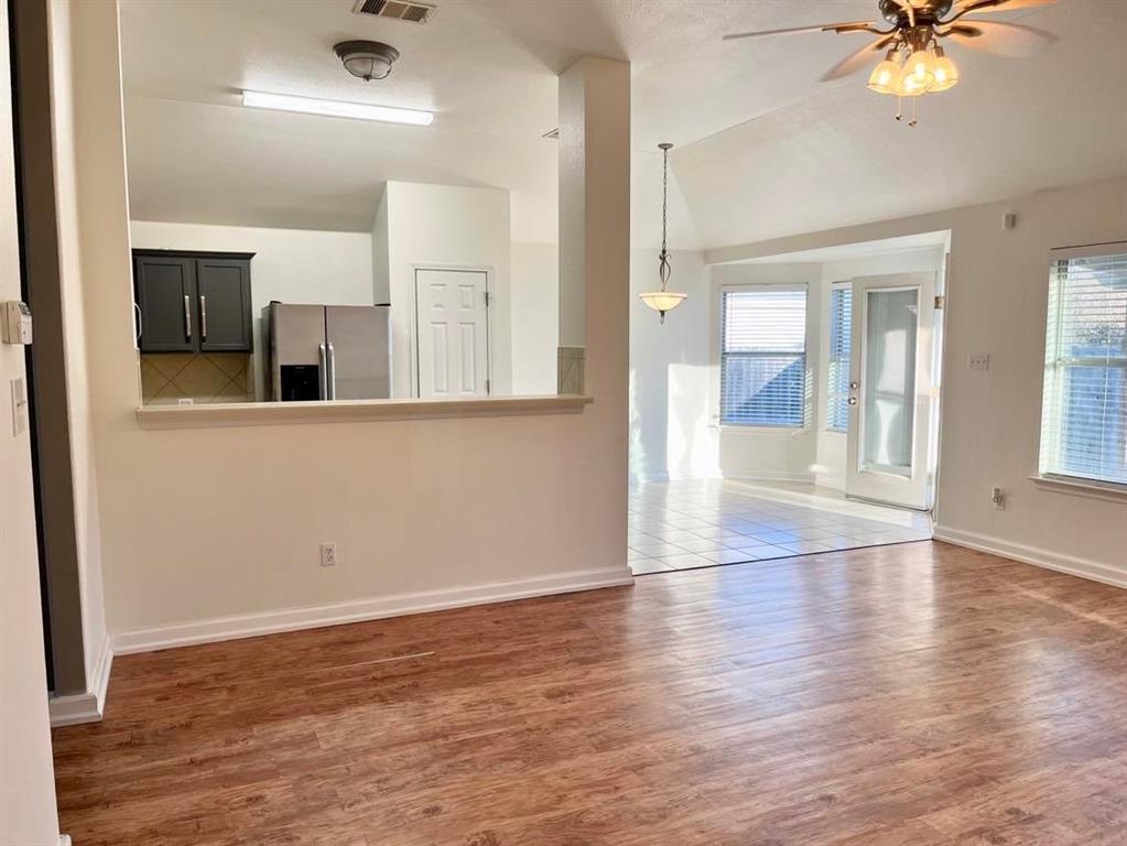 2409 Romeo Drive Cedar Park, TX 78613 - Photo 6 of 22 a view of a livingroom with wooden floor
