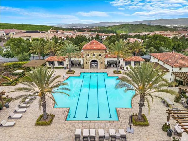 an aerial view of a house with a ocean view