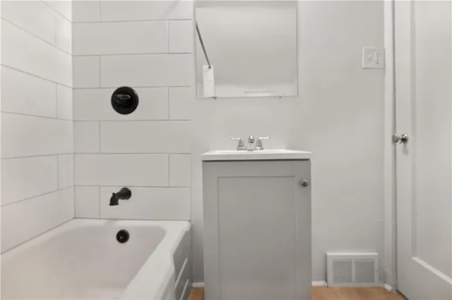 a bathroom with a bathtub
