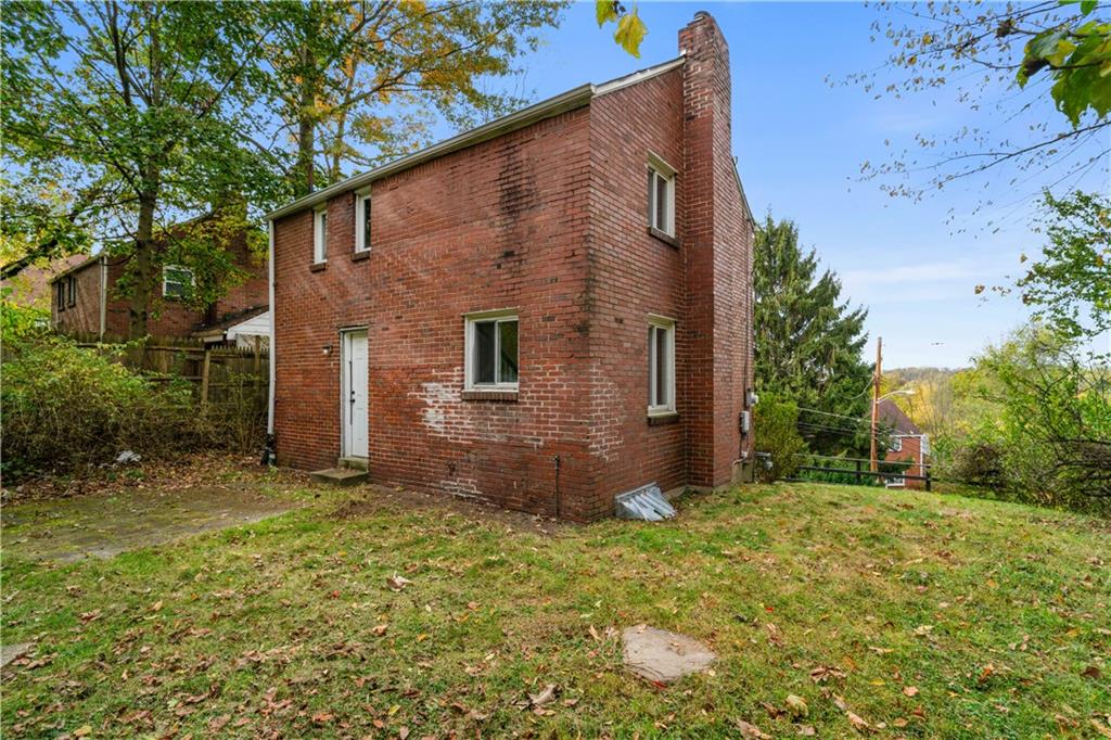 1525 Collins Road Pittsburgh, PA 15221 - Photo 18 of 21 a view of a backyard of the house