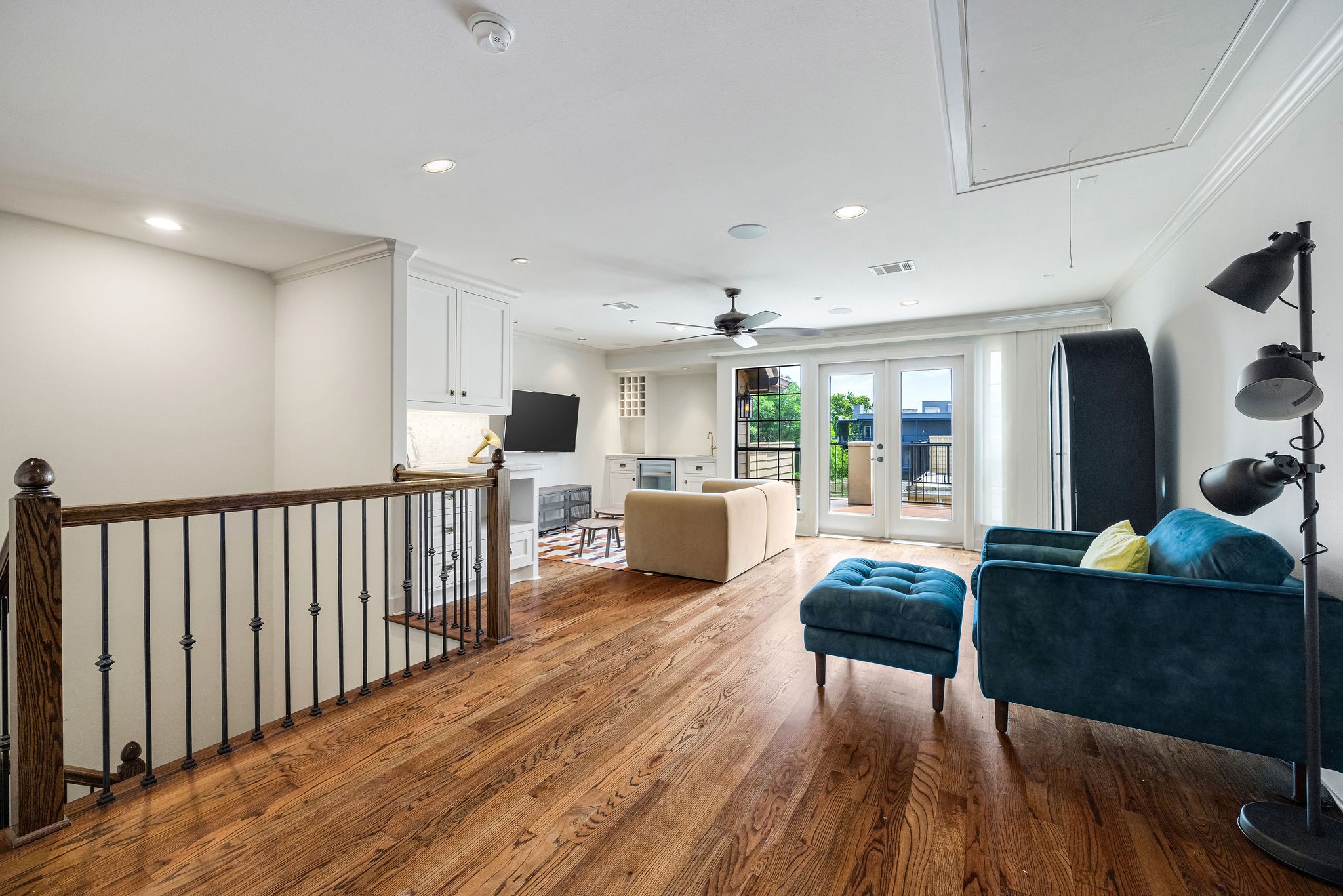 2415 Commonwealth Street Houston, TX 77006 - Photo 21 of 26 The expansive fourth-floor game room is the ultimate bonus space, offering endless possibilities for entertaining, relaxing, or creating a private retreat before stepping onto the rooftop deck.
