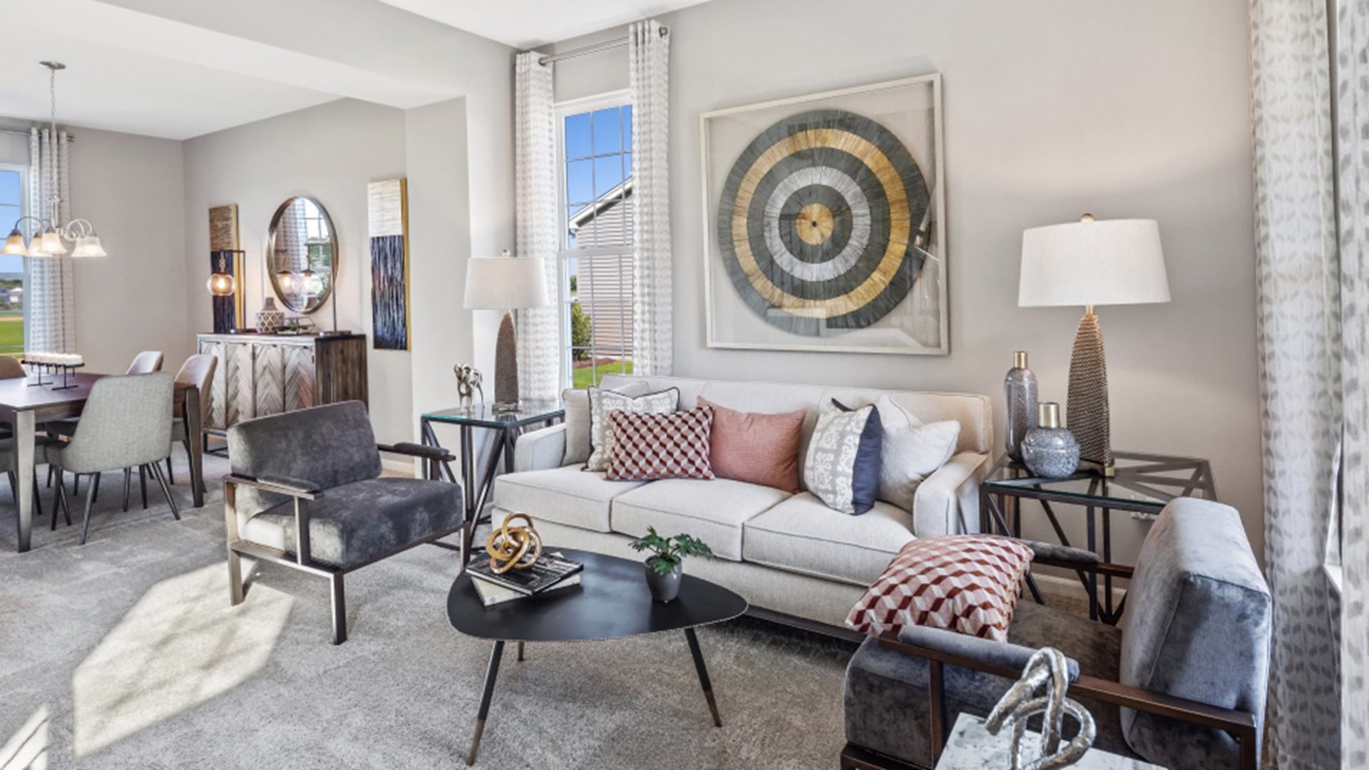 227 Conway Street Elburn, IL 60119 - Photo 8 of 14 a living room with furniture a clock and a lamp