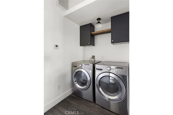 a workspace with furniture and a window