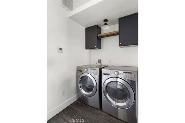 a workspace with furniture and a window