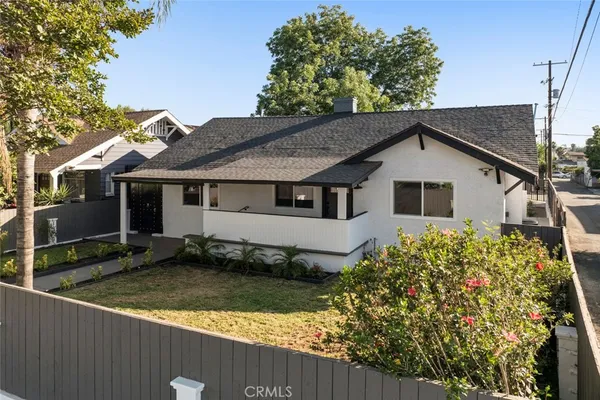 front view of a house with a yard