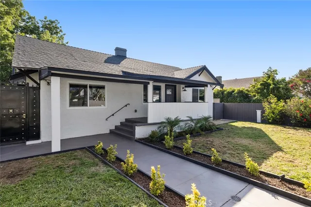front view of a house with a yard