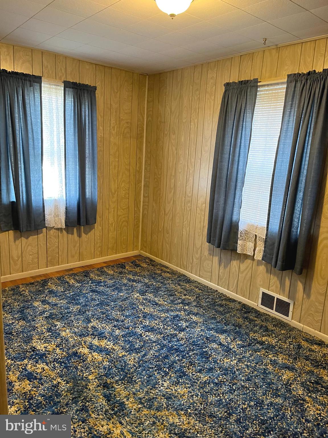 423 Meadow Road Baltimore, MD 21206 - Photo 10 of 20 a view of a door with wooden floor and door