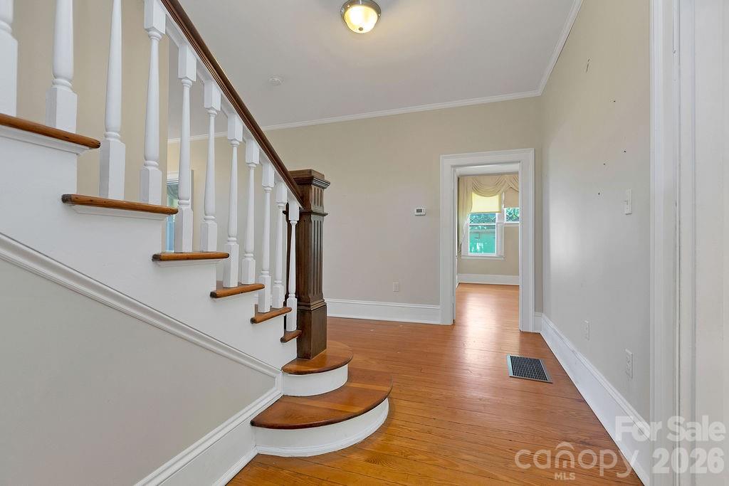 208 West Probart Street Brevard, NC 28712 - Photo 23 of 48 a view of entryway and hall with wooden floor