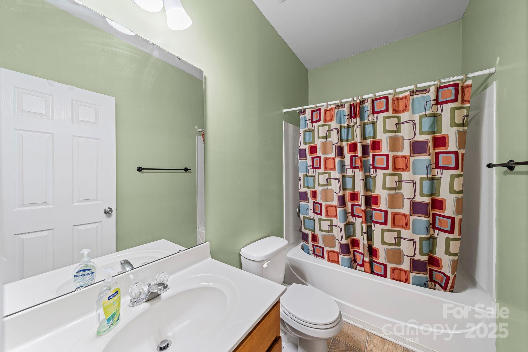 11608 Downy Birch Road Charlotte, NC 28227 - Photo 12 of 38 a bathroom with a sink toilet and shower