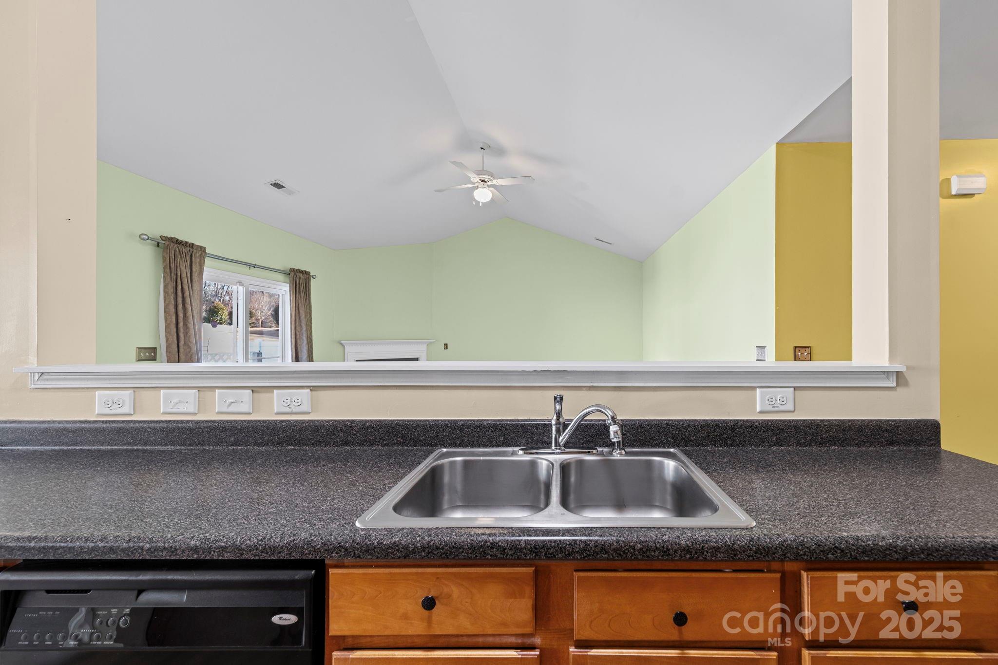 11608 Downy Birch Road Charlotte, NC 28227 - Photo 21 of 38 a kitchen with a sink and a window