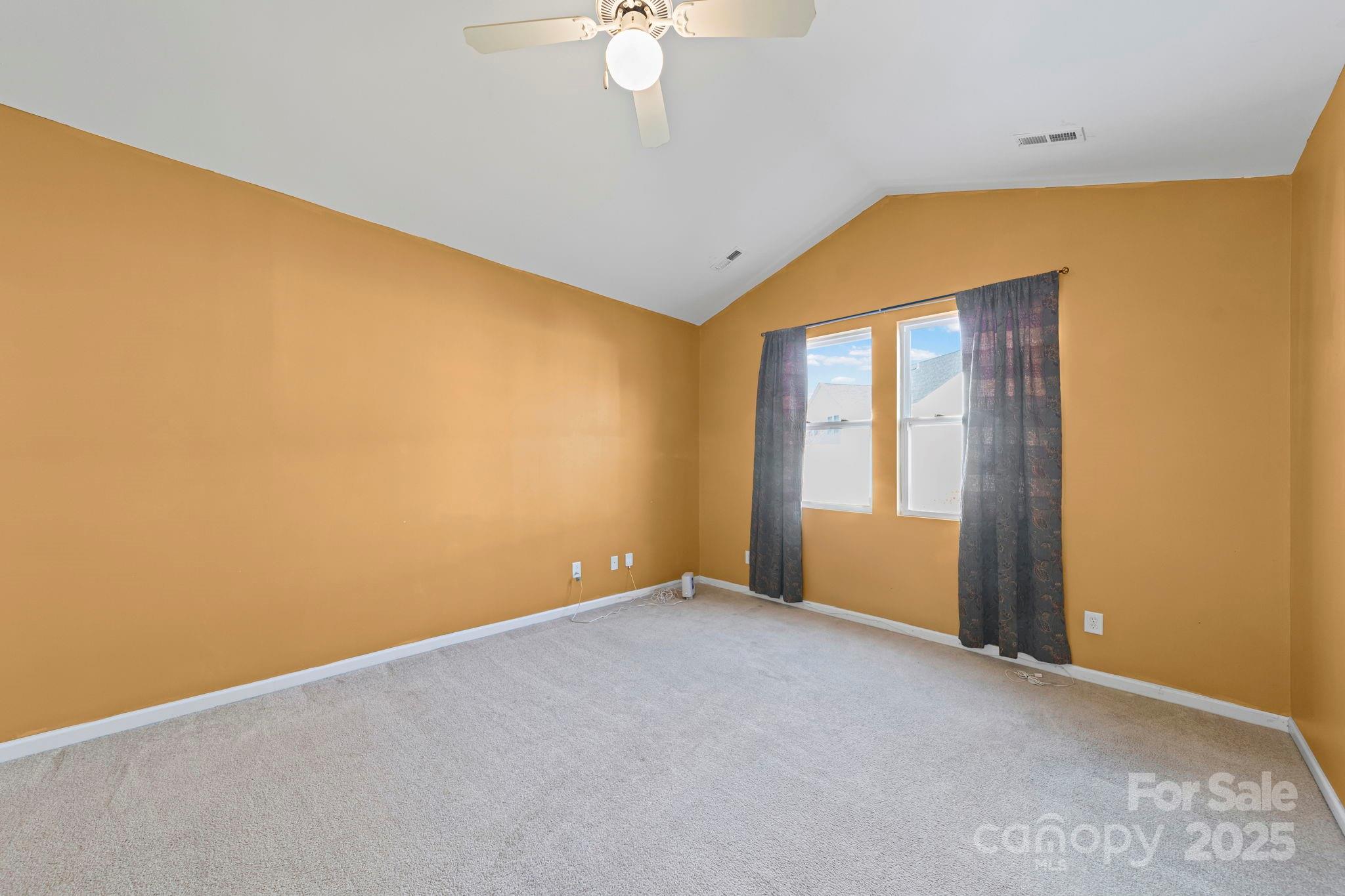 11608 Downy Birch Road Charlotte, NC 28227 - Photo 27 of 38 a view of an empty room with a window