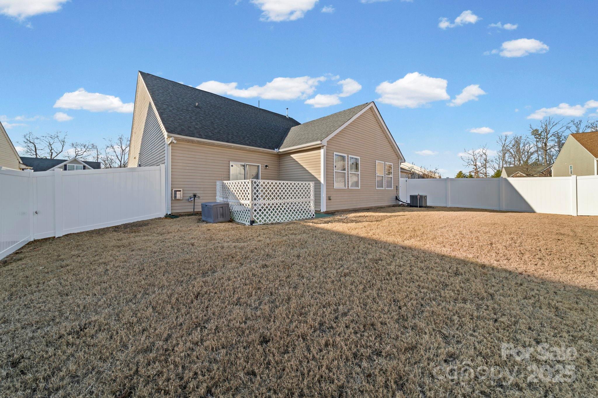 11608 Downy Birch Road Charlotte, NC 28227 - Photo 35 of 38 a view of a house with a backyard