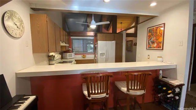 a bathroom with a sink a mirror and a toilet