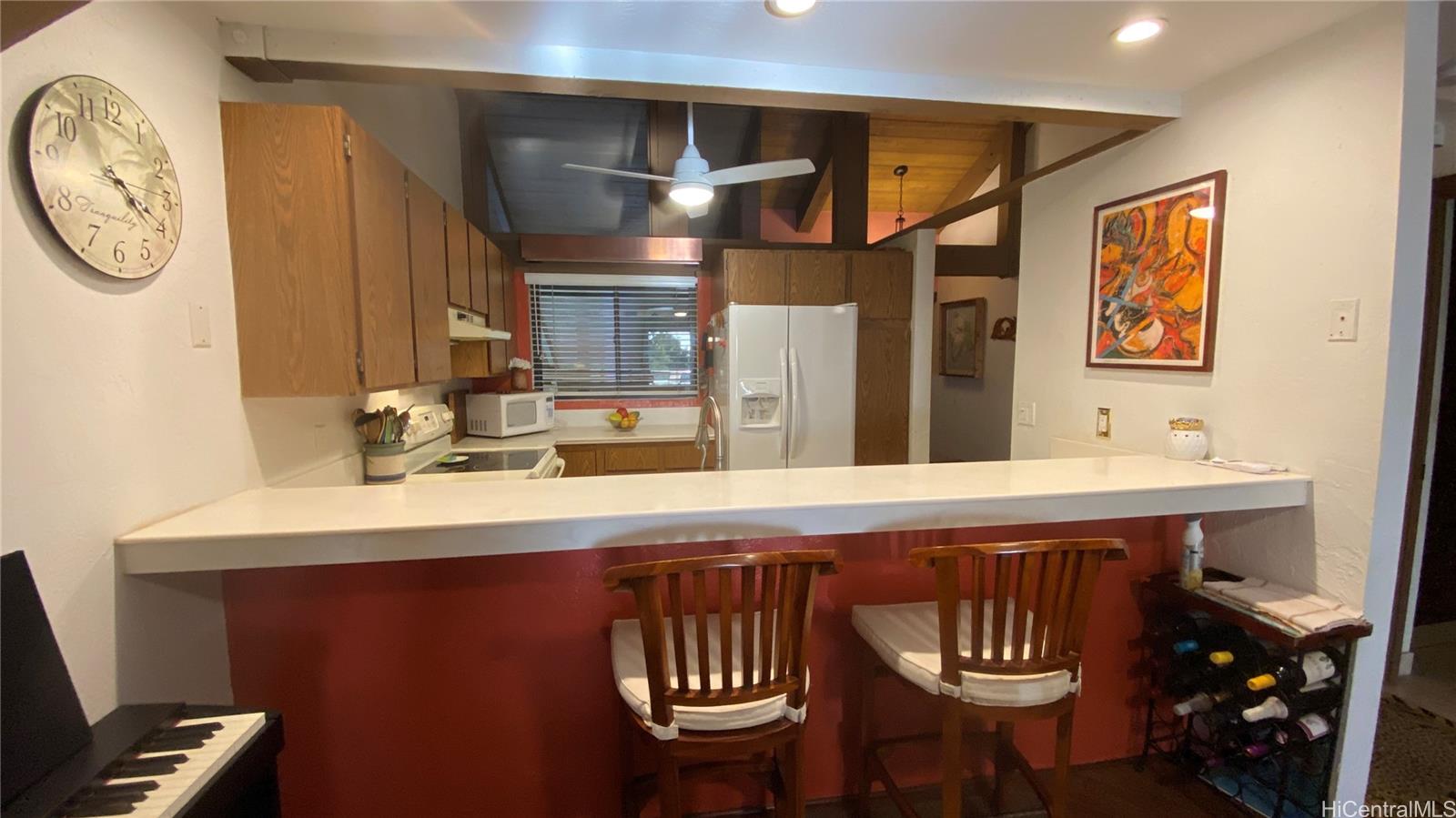a bathroom with a sink a mirror and a toilet