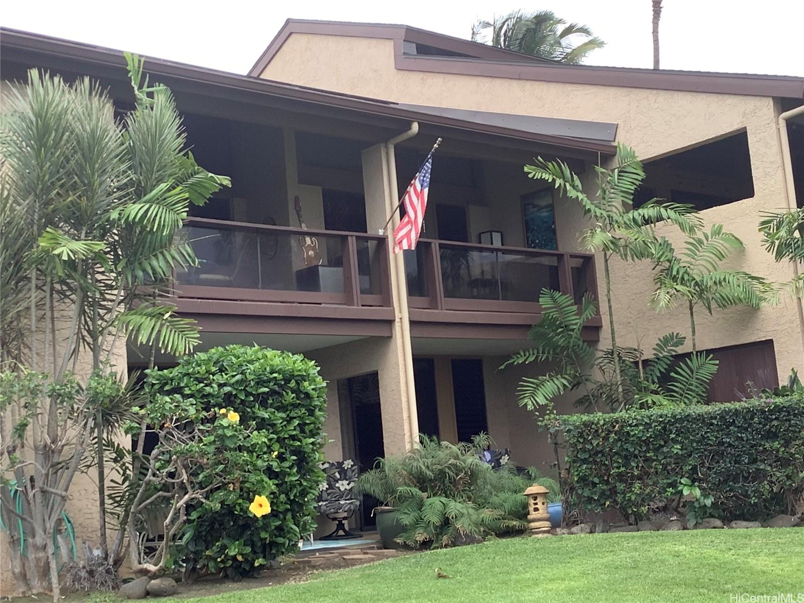 68-3840 Lua Kula Street, Unit E202 Waikoloa, HI 96738 - Photo 3 of 25 front view of house with a yard