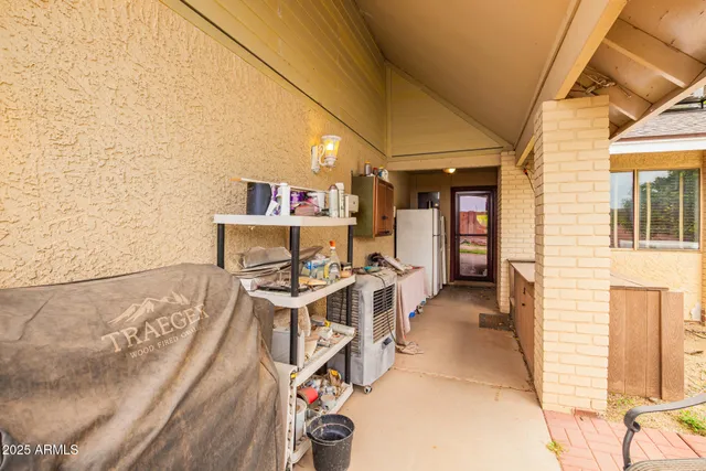 a view of a balcony with chairs