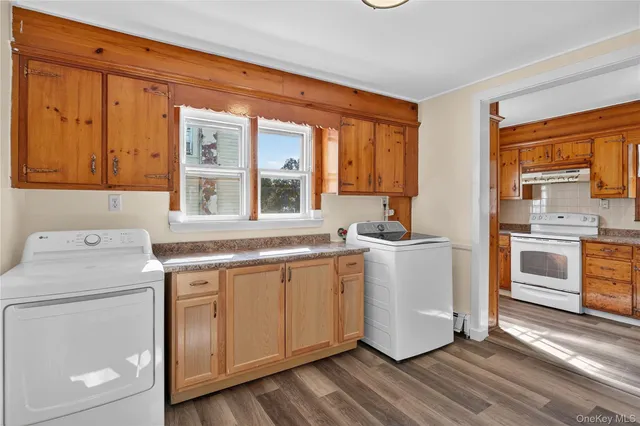 a kitchen with a stove and a sink