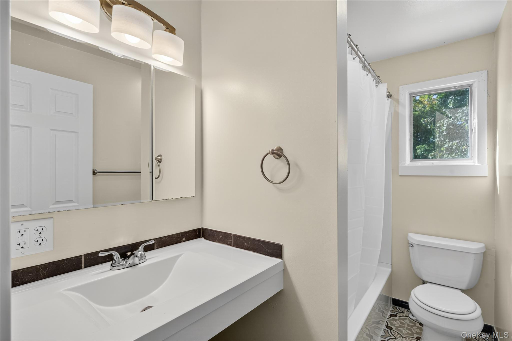 10 Howe Street Warwick, NY 10990 - Photo 27 of 33 a bathroom with a sink and a toilet