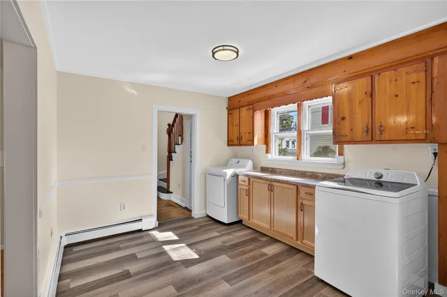 a kitchen with a refrigerator and a sink