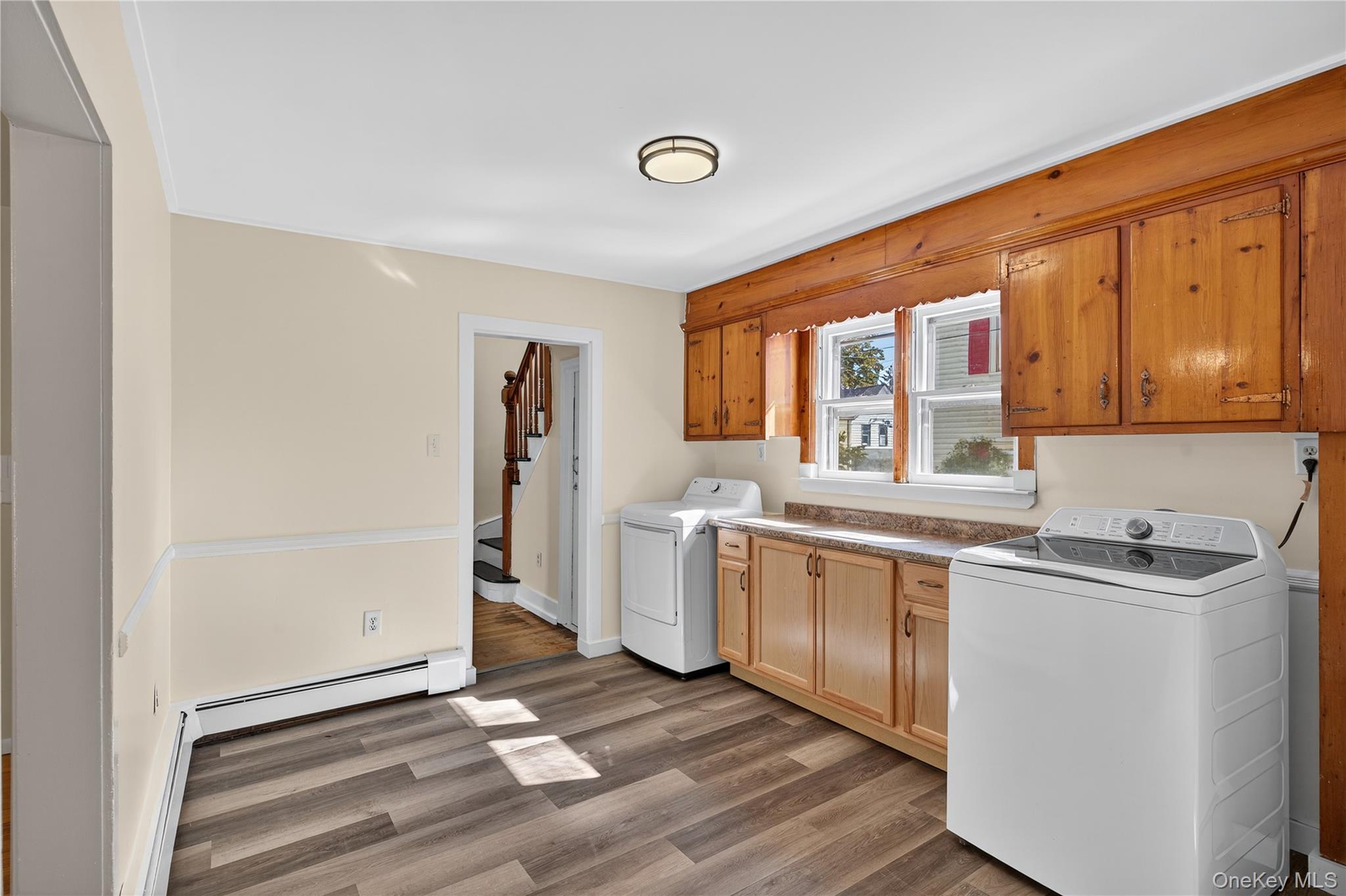 10 Howe Street Warwick, NY 10990 - Photo 10 of 33 a kitchen with a refrigerator and a sink