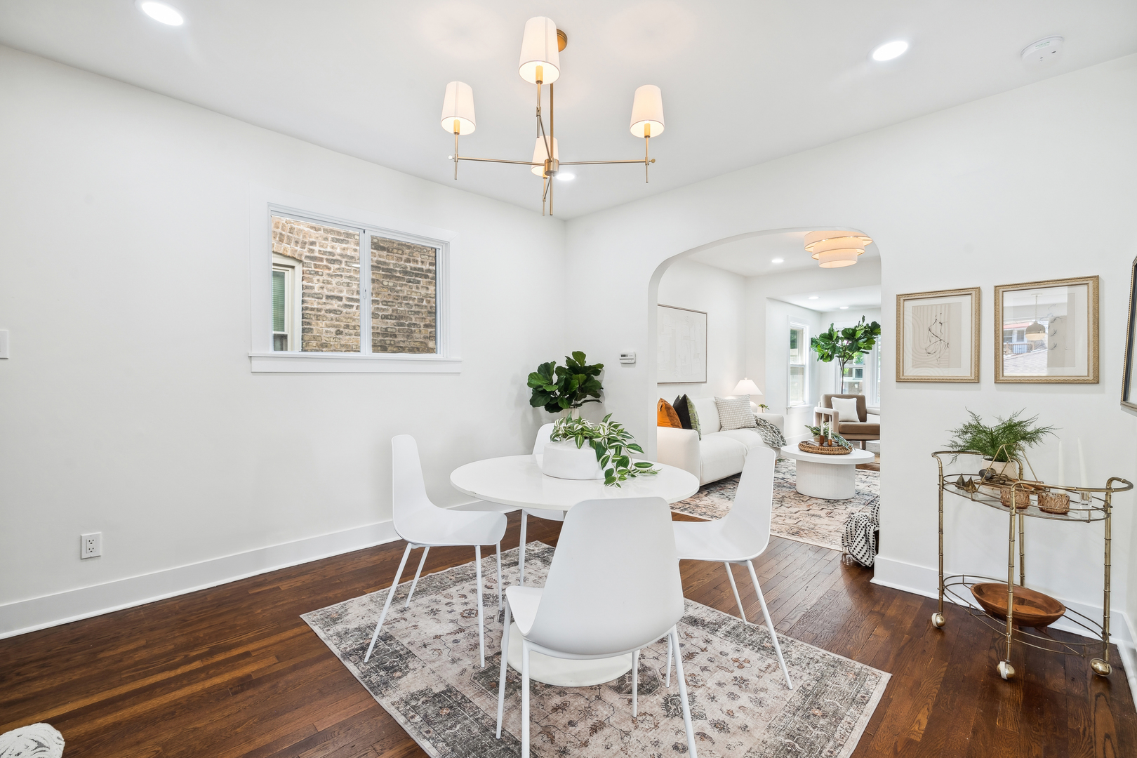 5435 North Lieb Avenue Chicago, IL 60630 - Photo 8 of 29 a view of a dining room with furniture and wooden floor