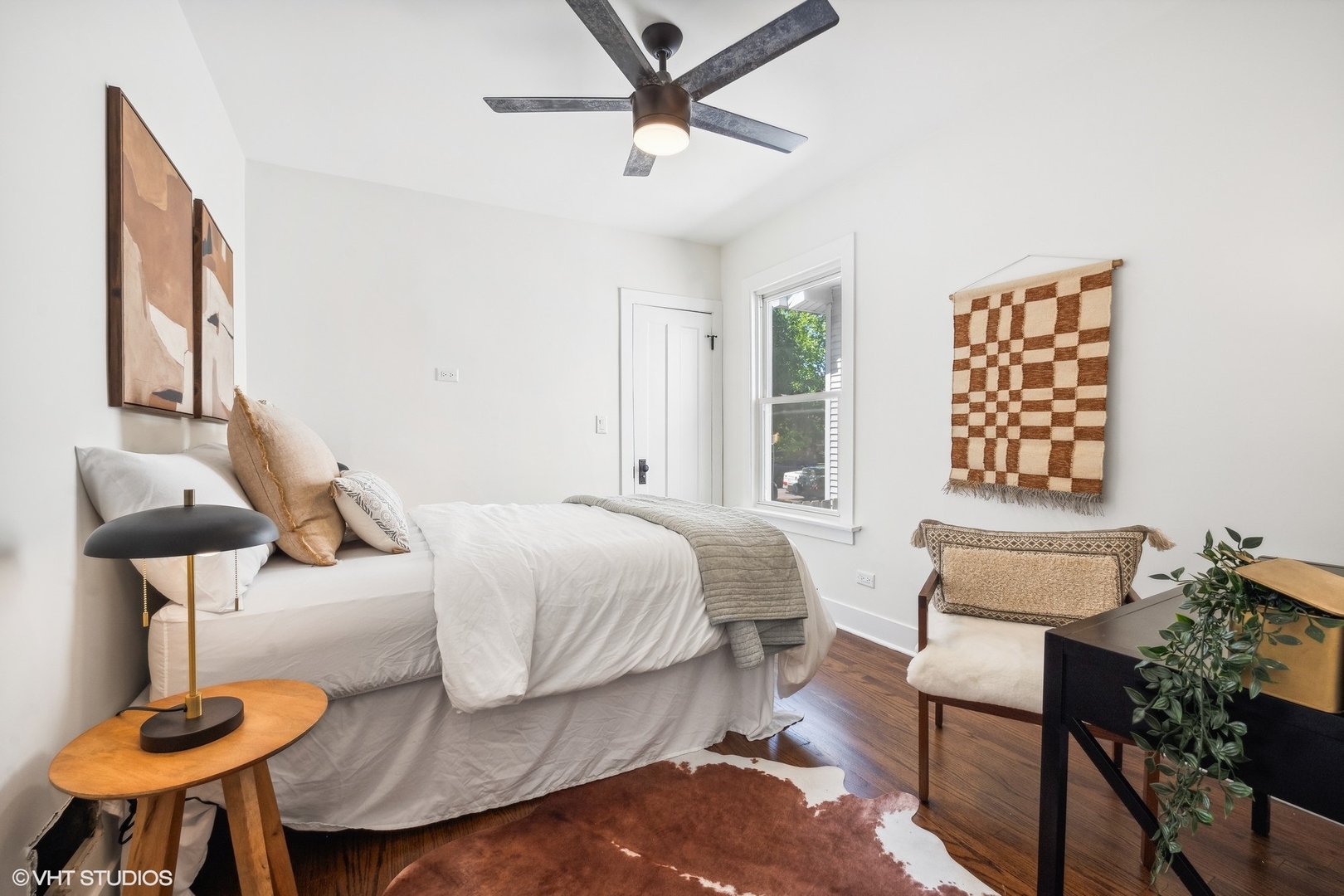 5435 North Lieb Avenue Chicago, IL 60630 - Photo 10 of 29 a bedroom with a bed window and a table