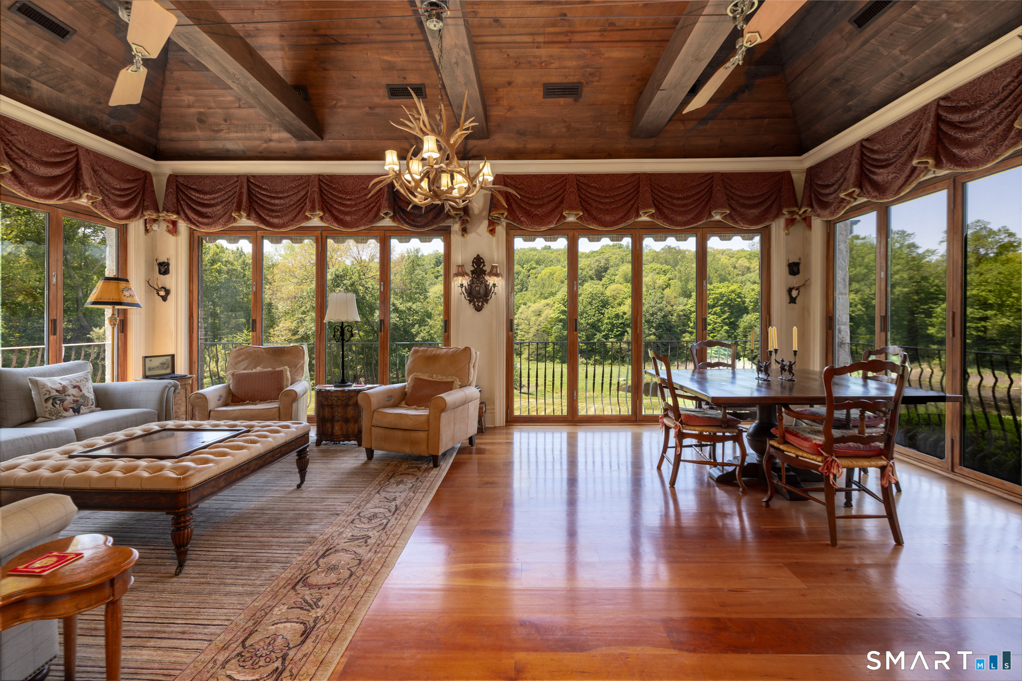 7 Equestrian Ridge Newtown, CT 06470 - Photo 20 of 40 a living room with furniture and a large window