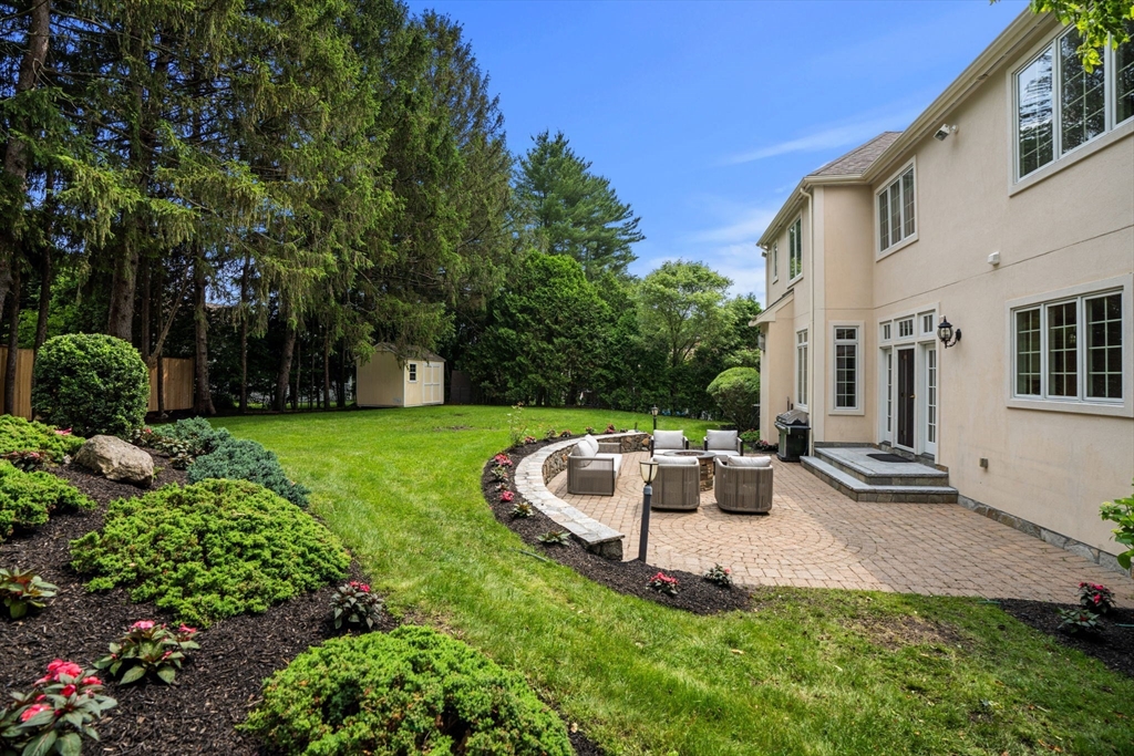 22 Scotney Road Newton, MA 02467 - Photo 4 of 42 a view of a house with backyard and sitting area