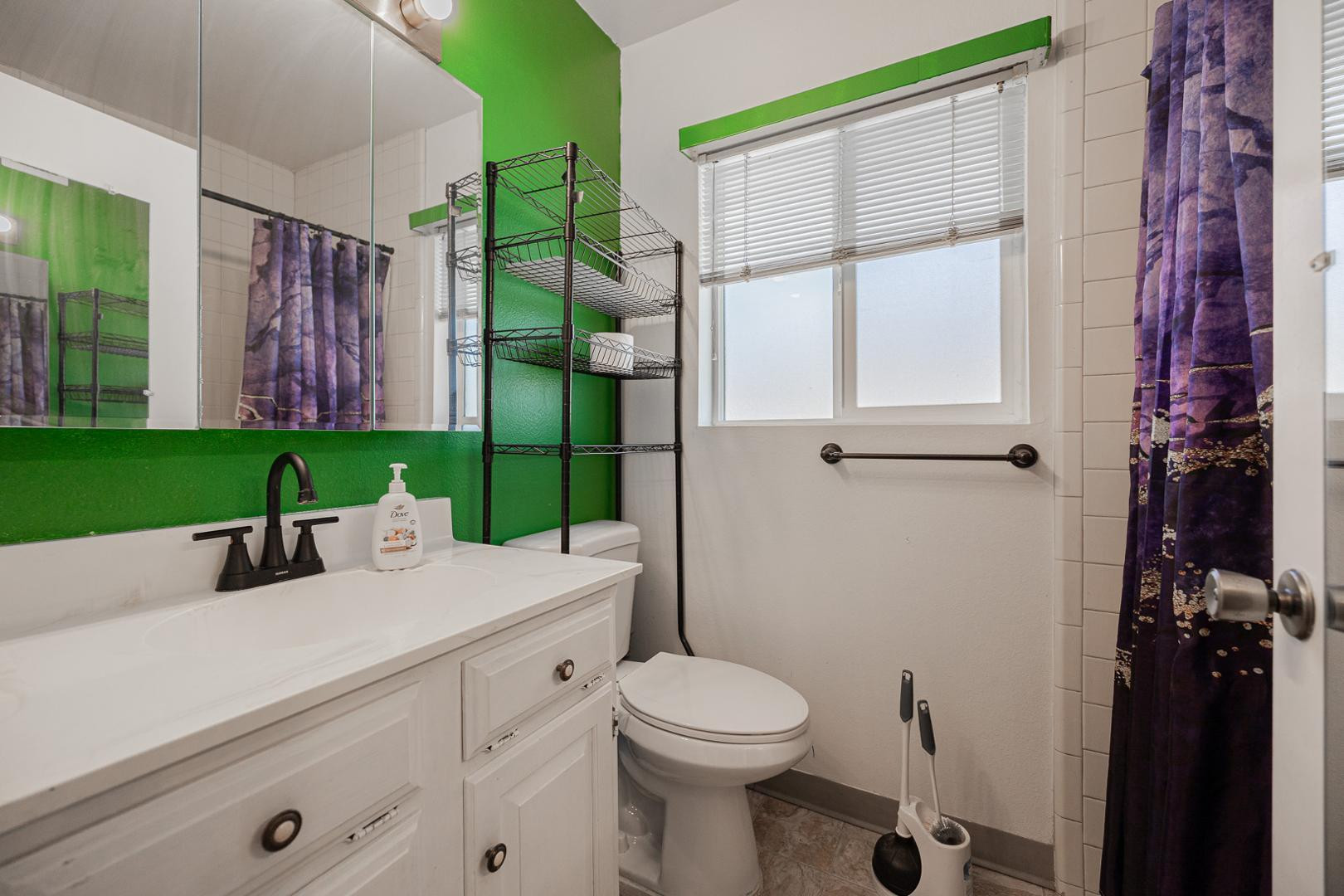 609 South Power Road, Unit 338 Mesa, AZ 85206 - Photo 19 of 24 a view of bathroom with a toilet sink and mirror