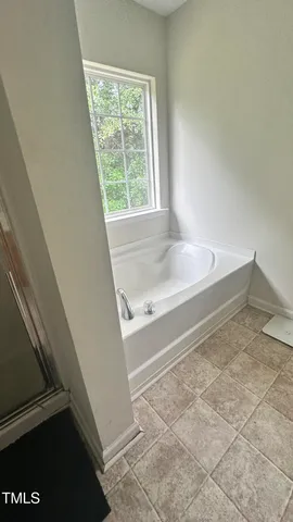 a bathroom with a sink and a bathtub