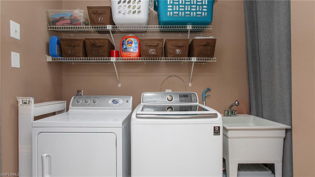 17269 Lee Road Fort Myers, FL 33967 - Photo 17 of 26 Clothes washing area featuring washer and clothes dryer and sink