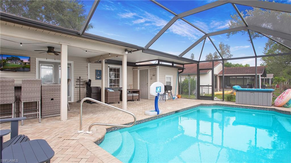 17269 Lee Road Fort Myers, FL 33967 - Photo 20 of 26 View of pool with a patio, a lanai, and ceiling fan