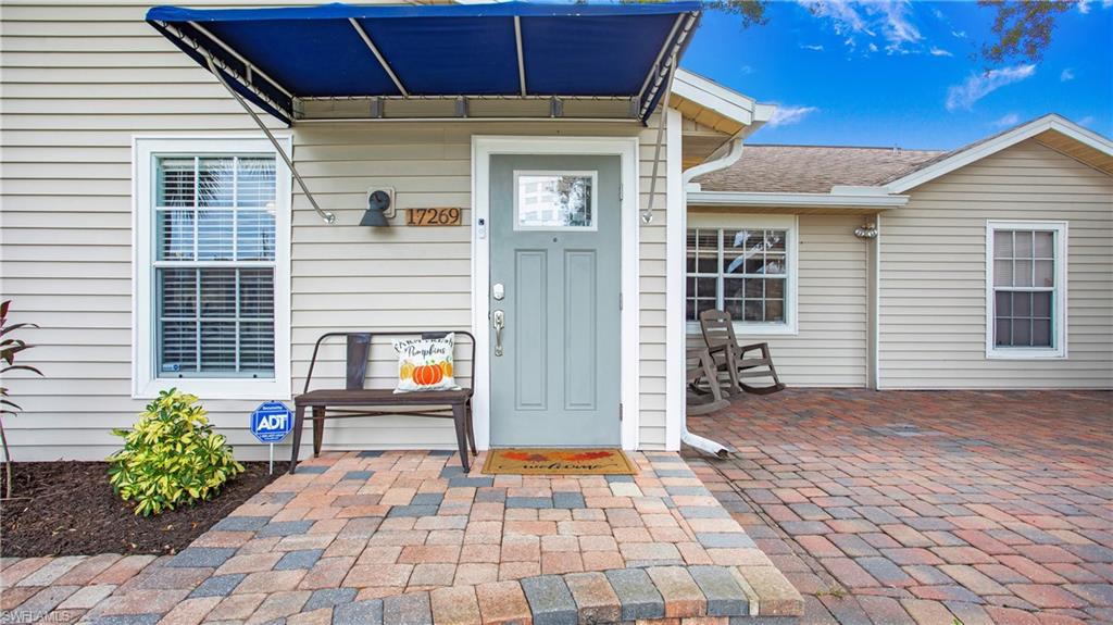17269 Lee Road Fort Myers, FL 33967 - Photo 4 of 26 Entrance to property with a patio area