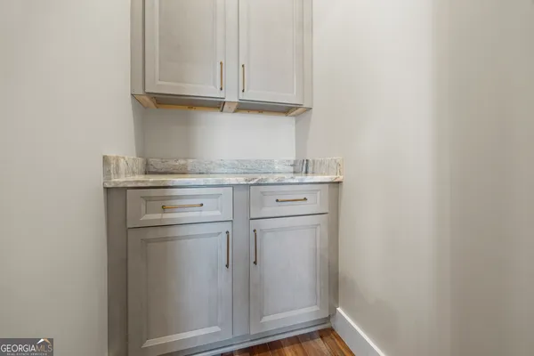 a bathroom with a toilet and a sink