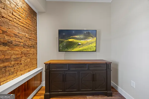 a view of a bedroom from a hallway