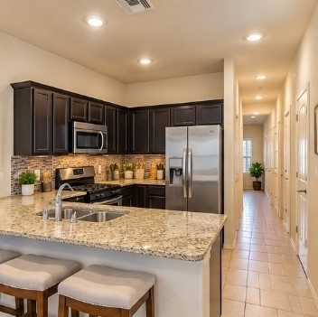 2634 Prancing Stream Drive Spring, TX 77373 - Photo 9 of 31 Kitchen-Breakfast & Dinning area - AI staged/enhanced
