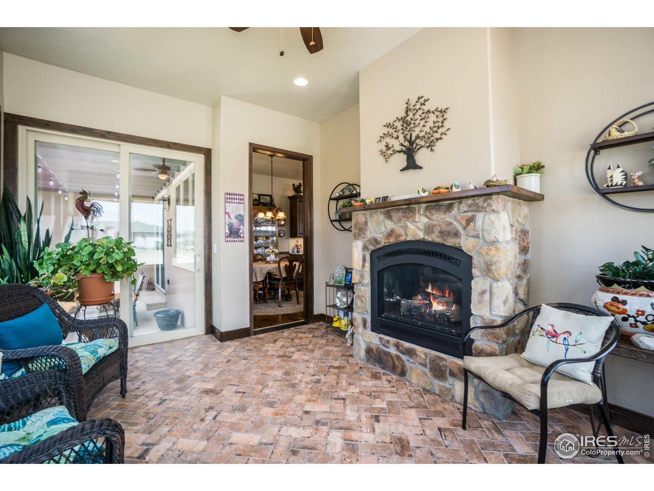 1515 Prairie Hawk Road Eaton, CO 80615 - Photo 9 of 26 Sun Room