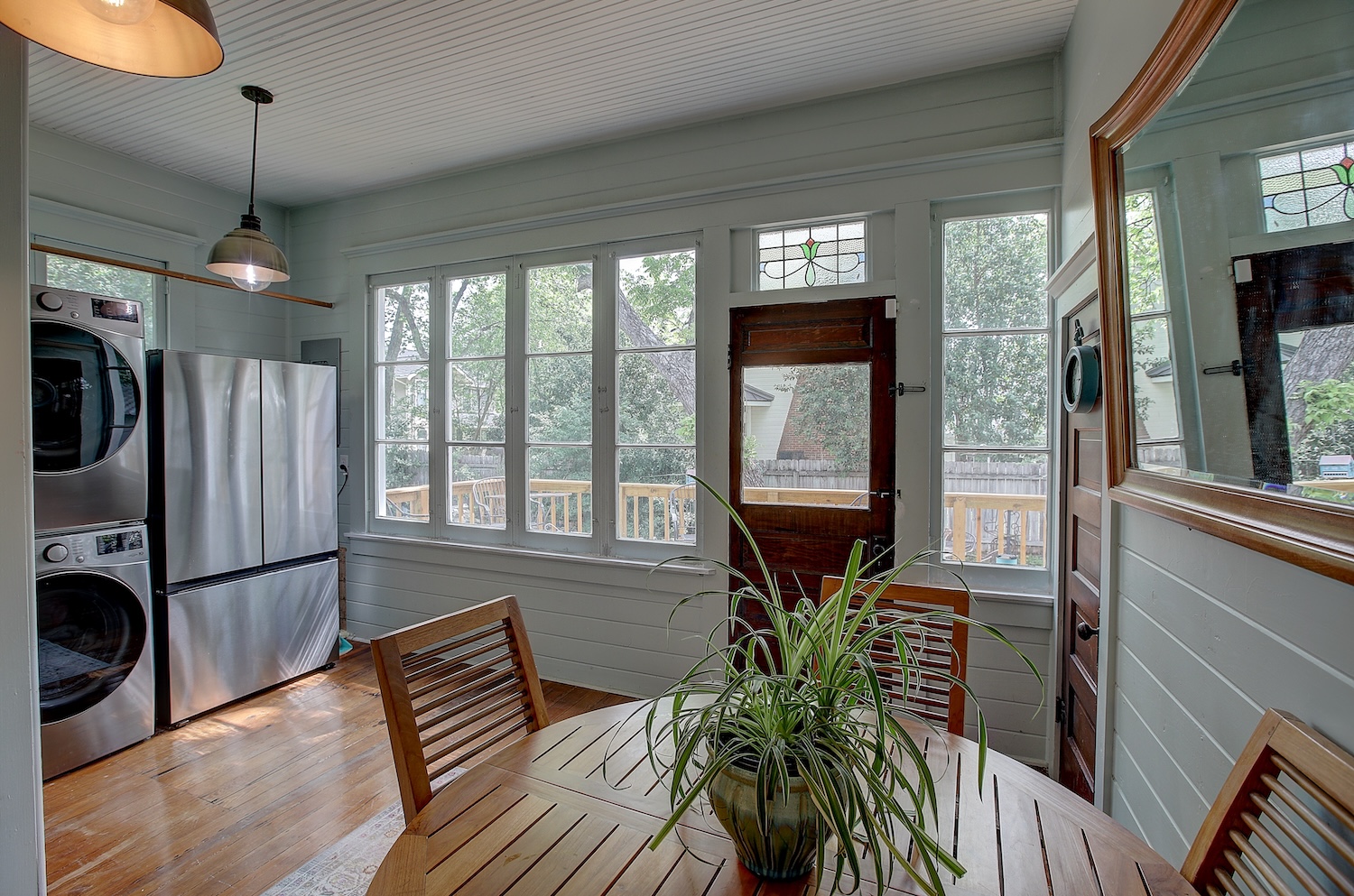 1903 South Austin Avenue Georgetown, TX 78626 - Photo 28 of 40 Shiplap walls and lots of windows make this room shine. East facing for dappled morning light, start your day here! adjacent to the kitchen, this room is triple duty. Breakfast, laundry, and mudroom! :)