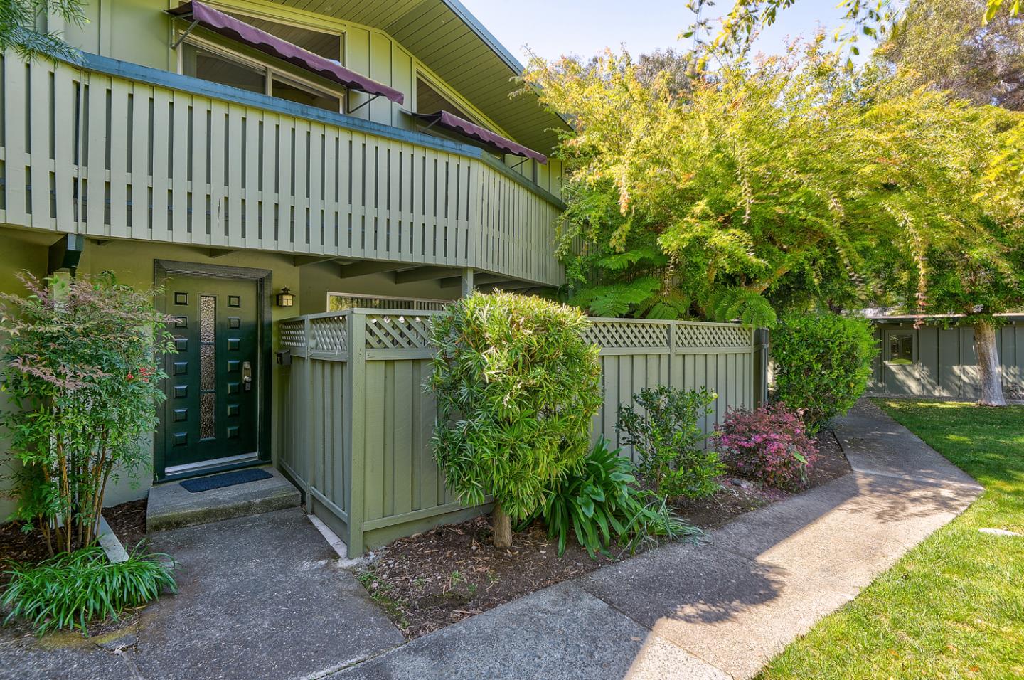 278 Monroe Drive, Unit 14 Mountain View, CA 94040 - Photo 18 of 20 a front view of a house with garden