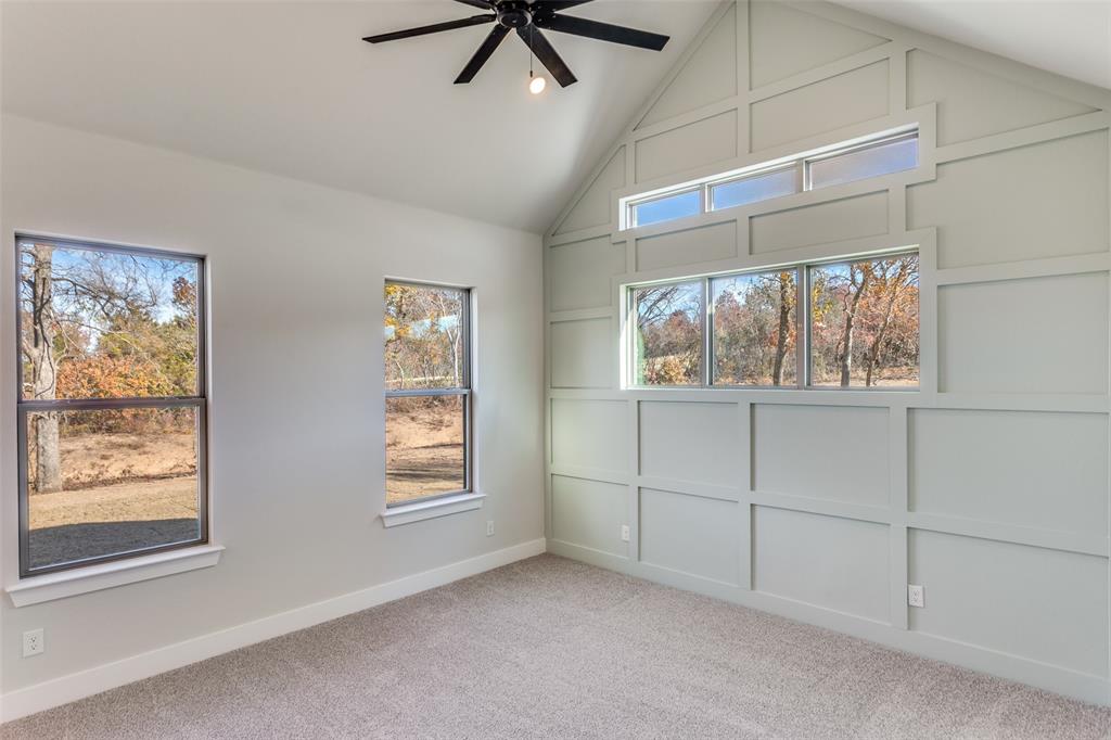 182 Fan Mill Trail Weatherford, TX 76085 - Photo 23 of 31 a view of an empty room with a window