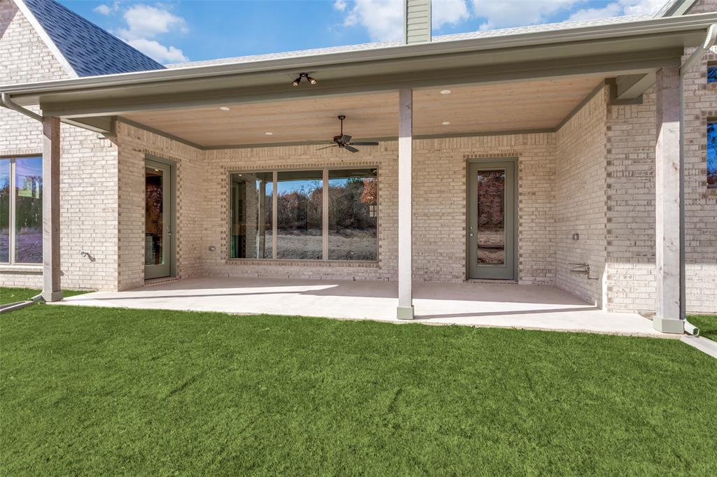 182 Fan Mill Trail Weatherford, TX 76085 - Photo 29 of 31 a view of a back yard of the house