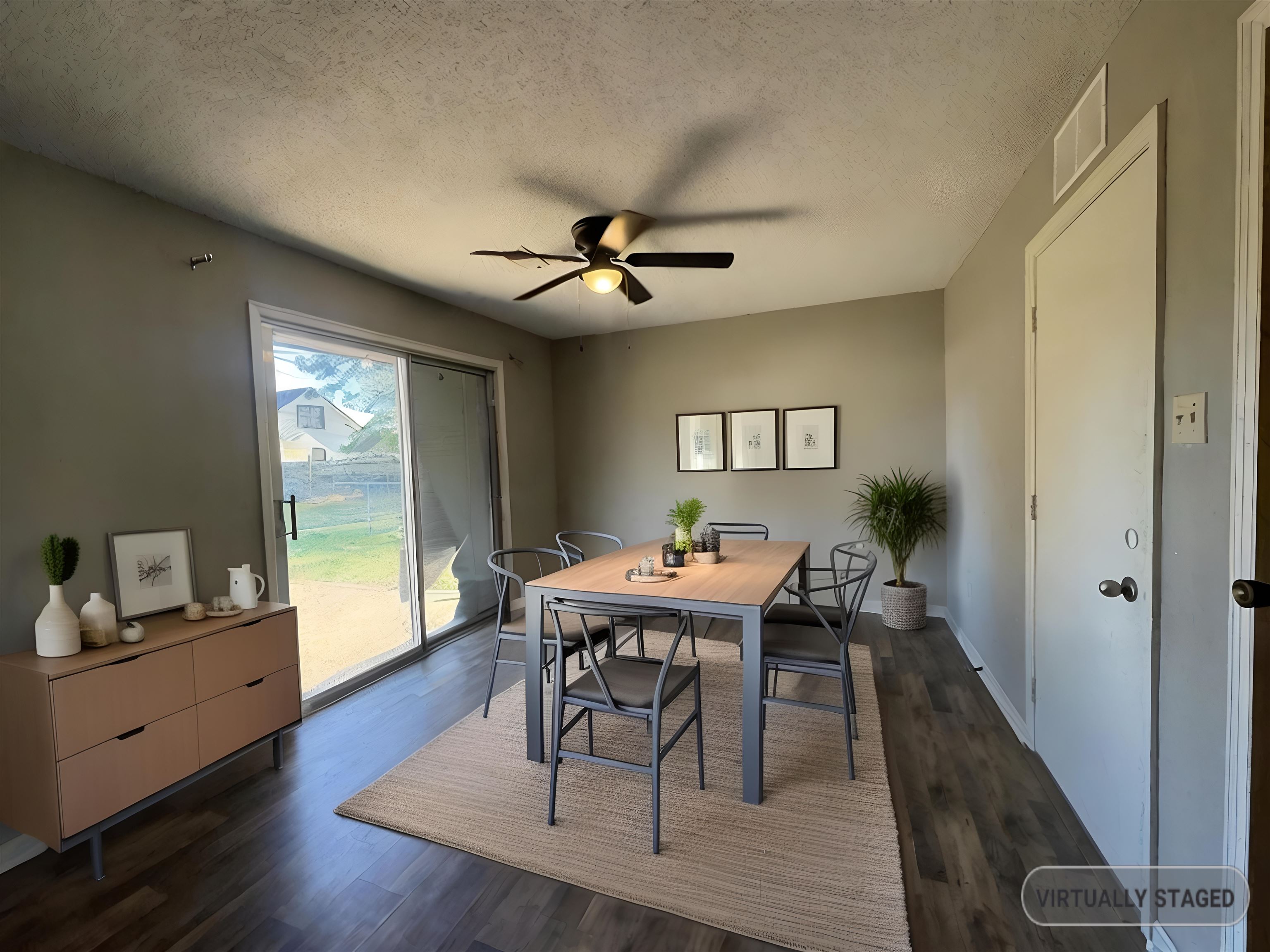 7824 Quito Road Millington, TN 38053 - Photo 9 of 24 Dining area featuring a textured ceiling, ceiling fan, and dark hardwood / wood-style floors
