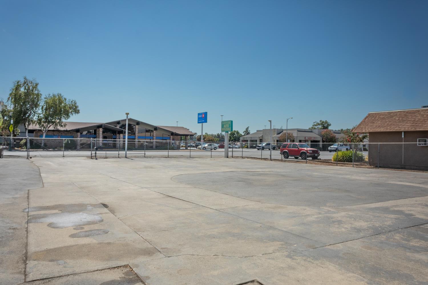 33 East Gridley Road Gridley, CA 95948 - Photo 15 of 53 a view of parking with cars parked