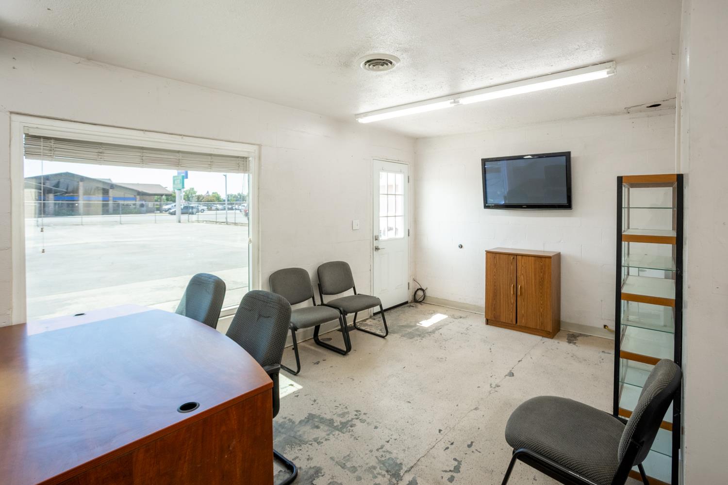 33 East Gridley Road Gridley, CA 95948 - Photo 25 of 53 a living room with furniture a flat screen tv and a fireplace