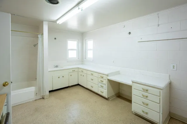 a room with furniture and a window