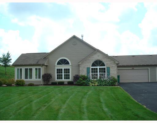 1024 Springfield Court Renfrew, PA 16053 - Photo 2 of 14 Exterior Back. A 2 car garage and large side yard.