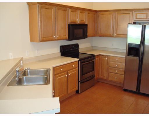 1024 Springfield Court Renfrew, PA 16053 - Photo 6 of 14 Kitchen. Equipped kitchen has oak cabinets and ceramic tile floor.